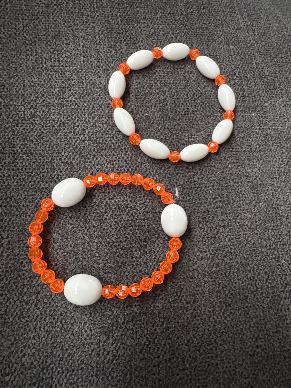 Woman’s hand made Orange and White Beaded Stretch Bracelets - Set of 2